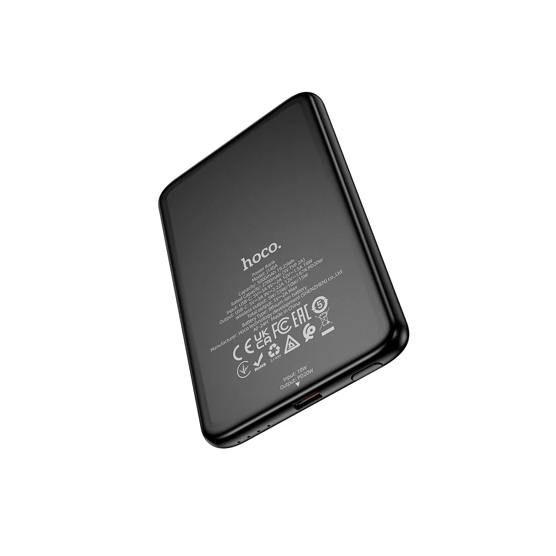 Power Bank Hoco J140a en color negro, vista trasera con especificaciones técnicas impresas y puerto USB-C visible, fondo blanco con margen perimetral